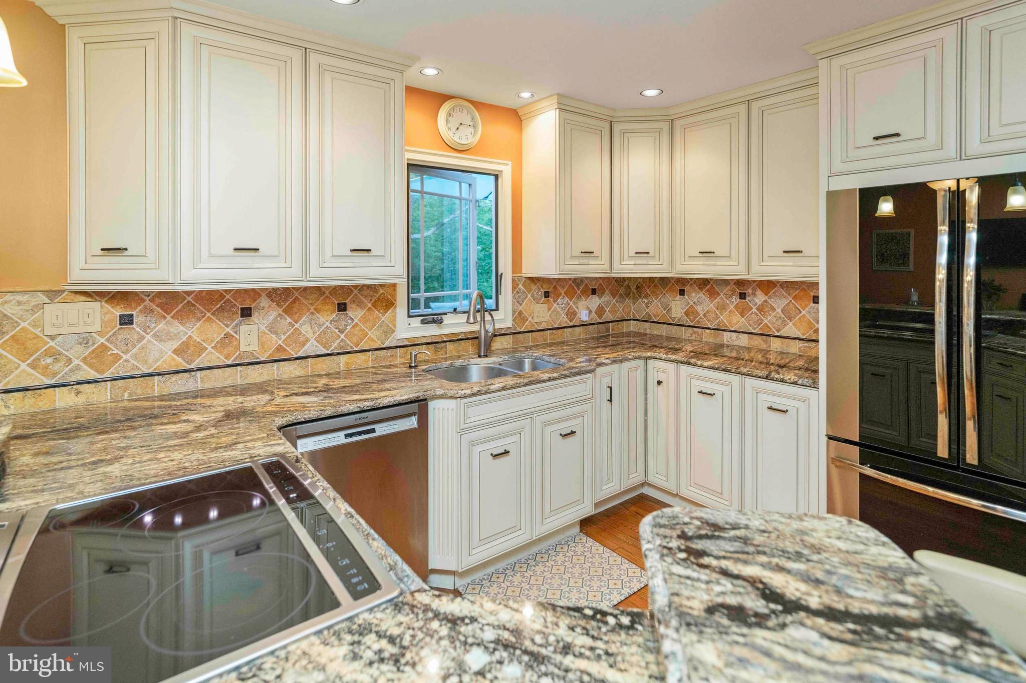 3097 Mill Road Doylestown, PA 18902 - Photo 17 of 115 a kitchen with stainless steel appliances granite countertop a sink stove and cabinets