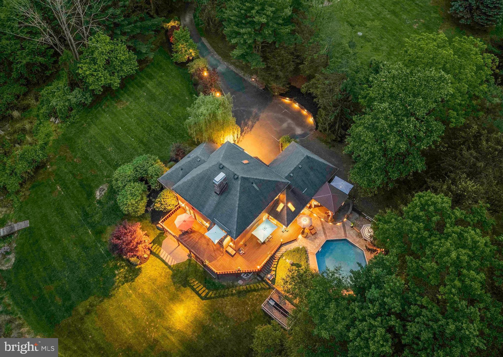 3097 Mill Road Doylestown, PA 18902 - Photo 3 of 115 an aerial view of a house with swimming pool and outdoor space