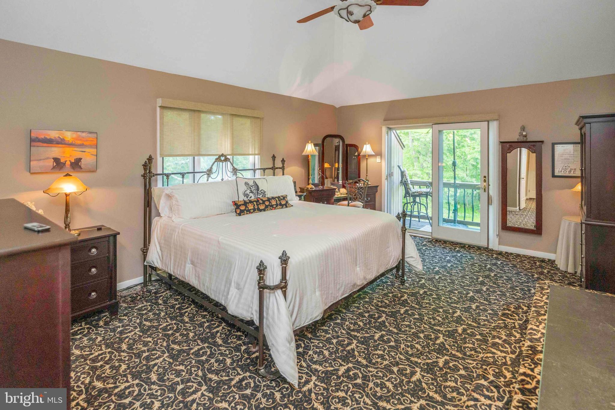 3097 Mill Road Doylestown, PA 18902 - Photo 35 of 115 a bed sitting in a spacious bedroom next to a window