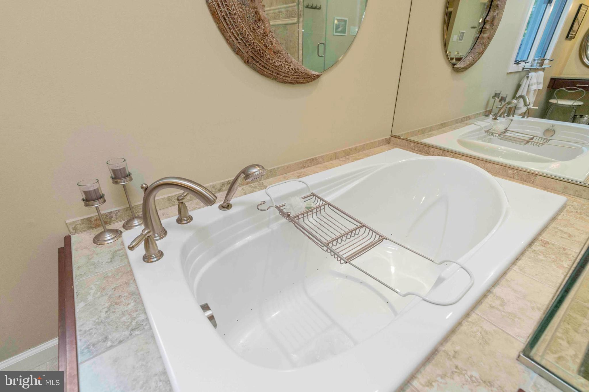 3097 Mill Road Doylestown, PA 18902 - Photo 38 of 115 a bathroom with a sink and mirror