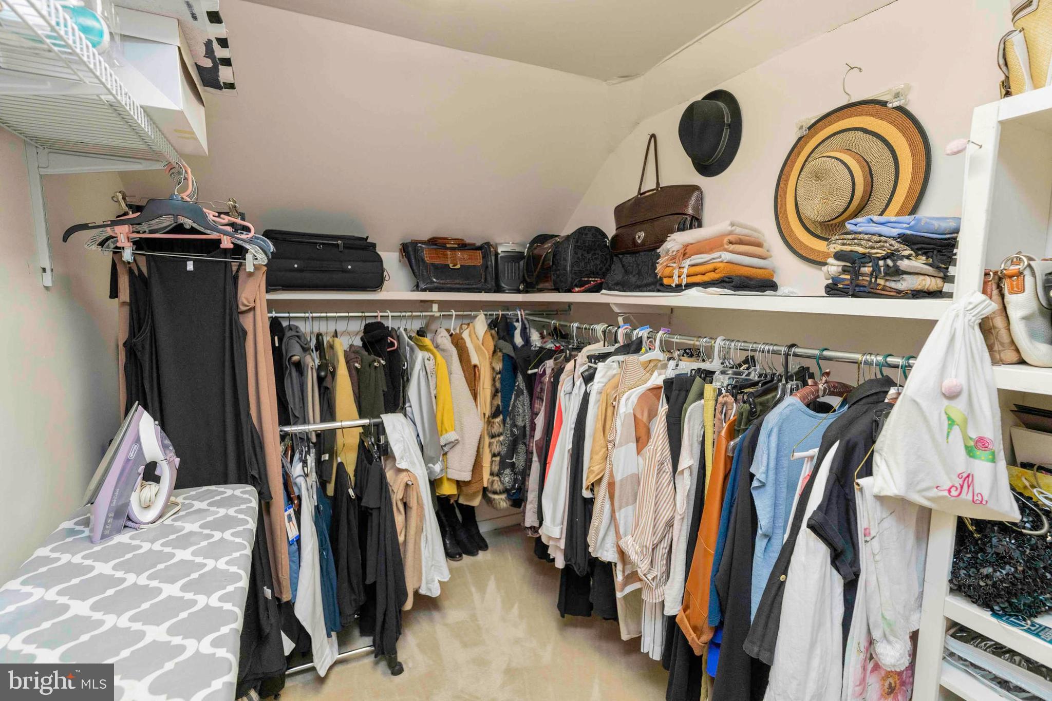 3097 Mill Road Doylestown, PA 18902 - Photo 43 of 115 a view of walk in closet with clothes and shoes