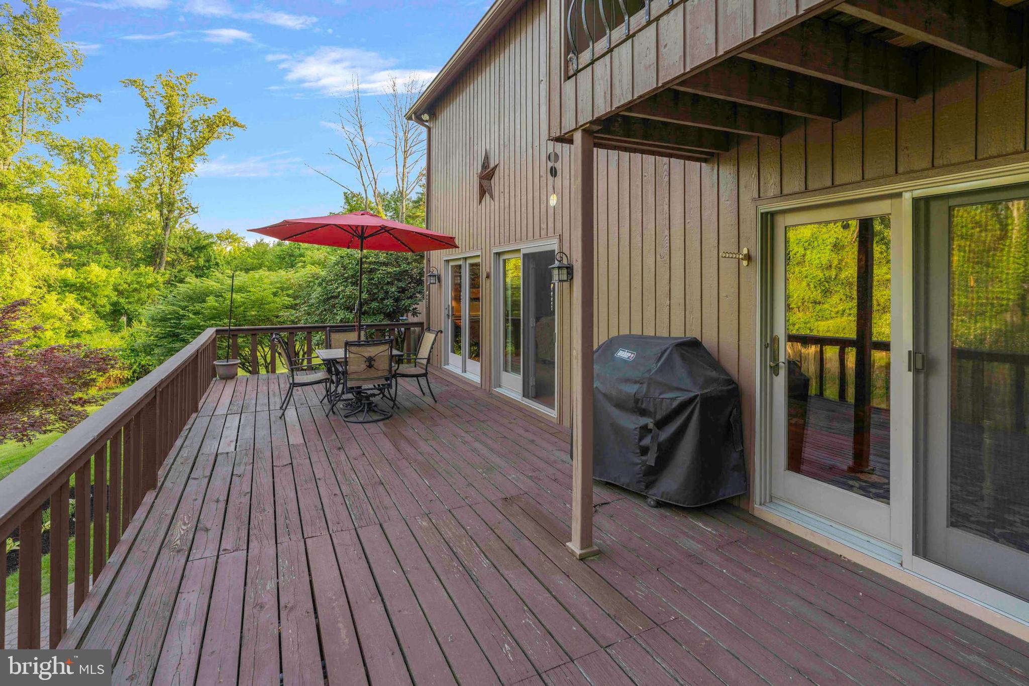3097 Mill Road Doylestown, PA 18902 - Photo 93 of 115 a view of balcony with furniture and wooden floor
