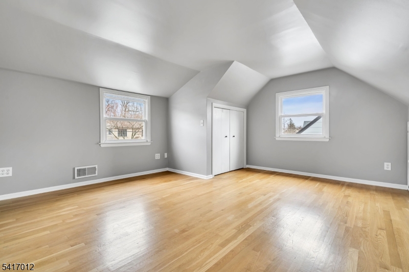 823 Pinewood Road Union, NJ 07083 - Photo 16 of 28 an empty room with windows and closet