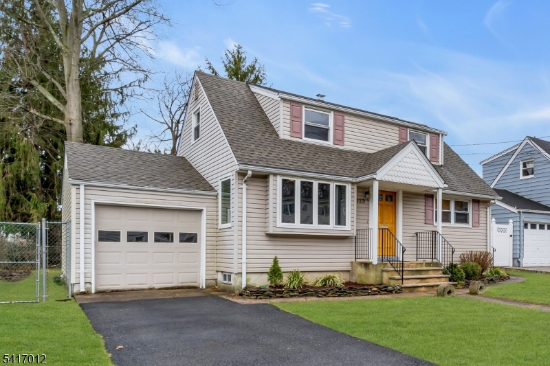 823 Pinewood Road Union, NJ 07083 - Photo 2 of 28 a front view of a house with a yard