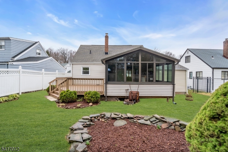 823 Pinewood Road Union, NJ 07083 - Photo 22 of 28 a front view of a house with a garden