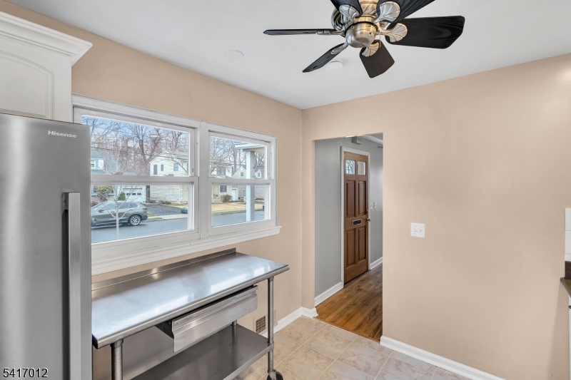 823 Pinewood Road Union, NJ 07083 - Photo 8 of 28 a view of a hallway with a chandelier
