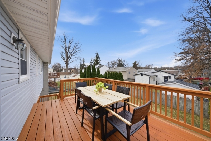 11 Deerfield Road Parsippany, NJ 07054 - Photo 15 of 42 a balcony with wooden floor and city view