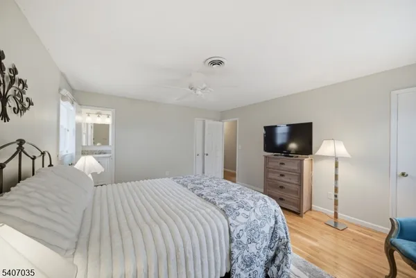 a view of a livingroom with wooden floor