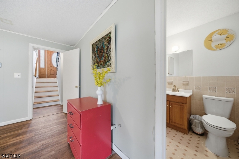 11 Deerfield Road Parsippany, NJ 07054 - Photo 37 of 42 a bathroom with a toilet and a shower