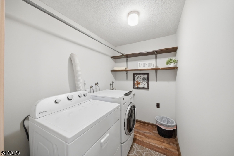 11 Deerfield Road Parsippany, NJ 07054 - Photo 39 of 42 a utility room with dryer and washer
