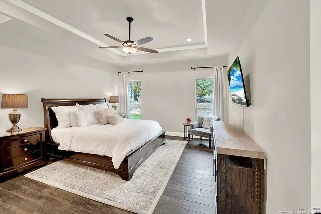 a bedroom with bed and window