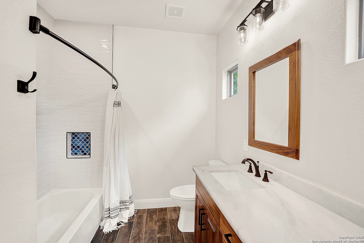 173 Hidden Pond Adkins, TX 78101 - Photo 26 of 40 a bathroom with a sink a toilet and shower