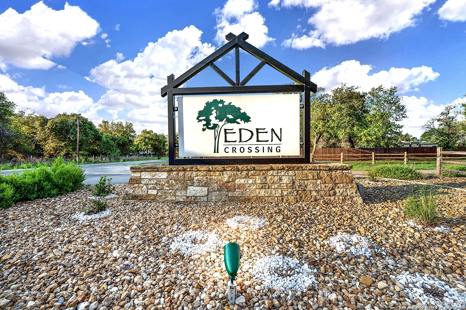 173 Hidden Pond Adkins, TX 78101 - Photo 39 of 40 a view of a pathway with a wrought fence