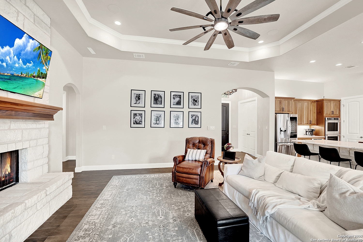 173 Hidden Pond Adkins, TX 78101 - Photo 8 of 40 a living room with furniture and a fireplace