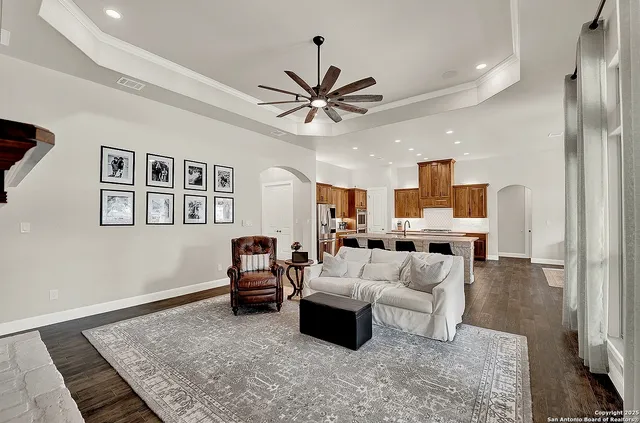a living room with furniture and a rug