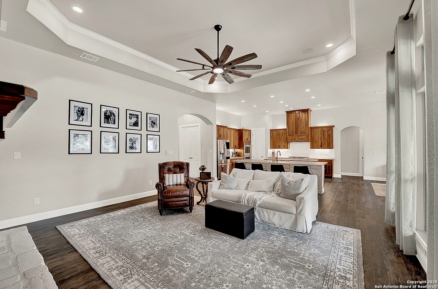 173 Hidden Pond Adkins, TX 78101 - Photo 9 of 40 a living room with furniture and a rug