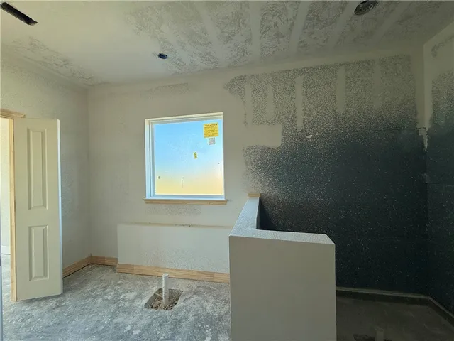 a view of ocean view with boats and trees in the background