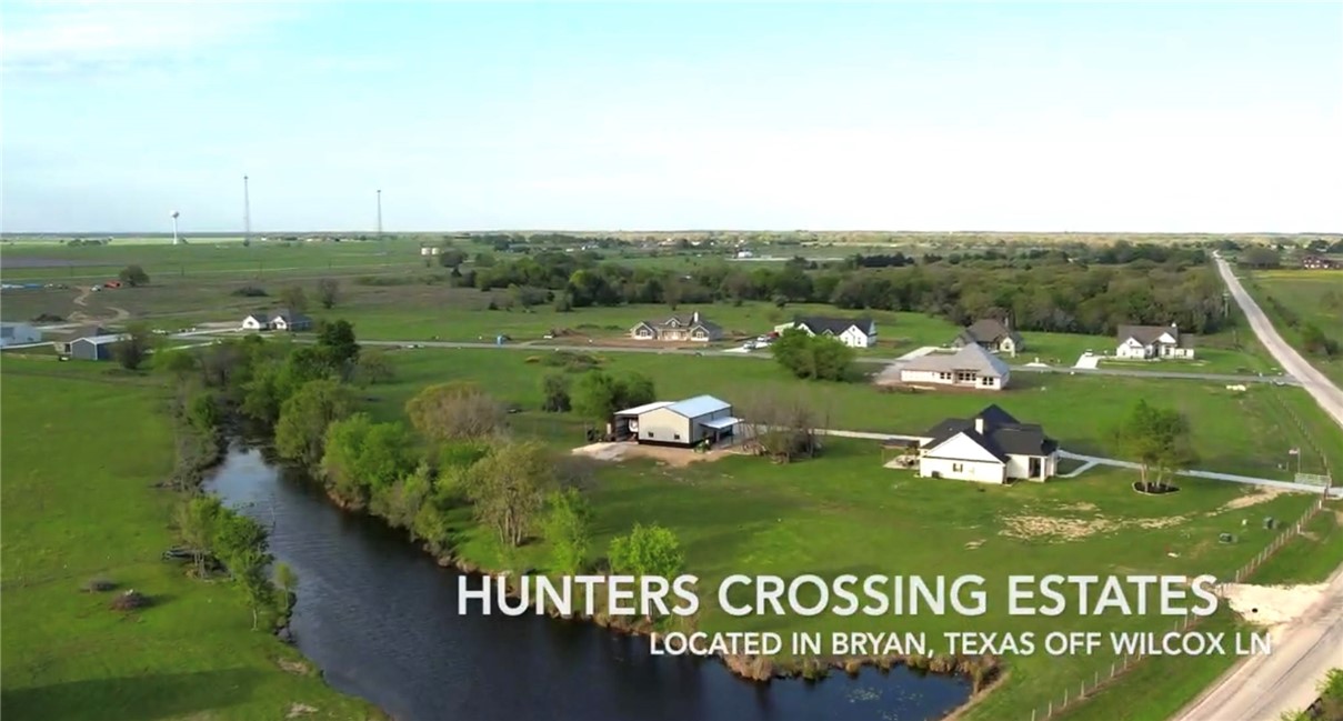 3245 Hunters Crossing Bryan, TX 77808 - Photo 4 of 26 a view of a park with welcome board