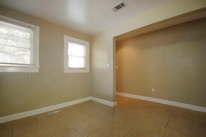 610 West 35th Street, Unit A Austin, TX 78705 - Photo 13 of 16 an empty room with windows