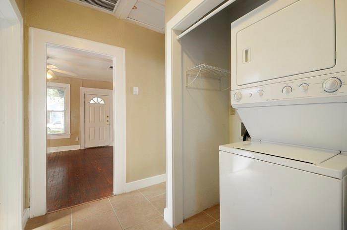 610 West 35th Street, Unit A Austin, TX 78705 - Photo 10 of 16 a view of washer and dryer with door in the background