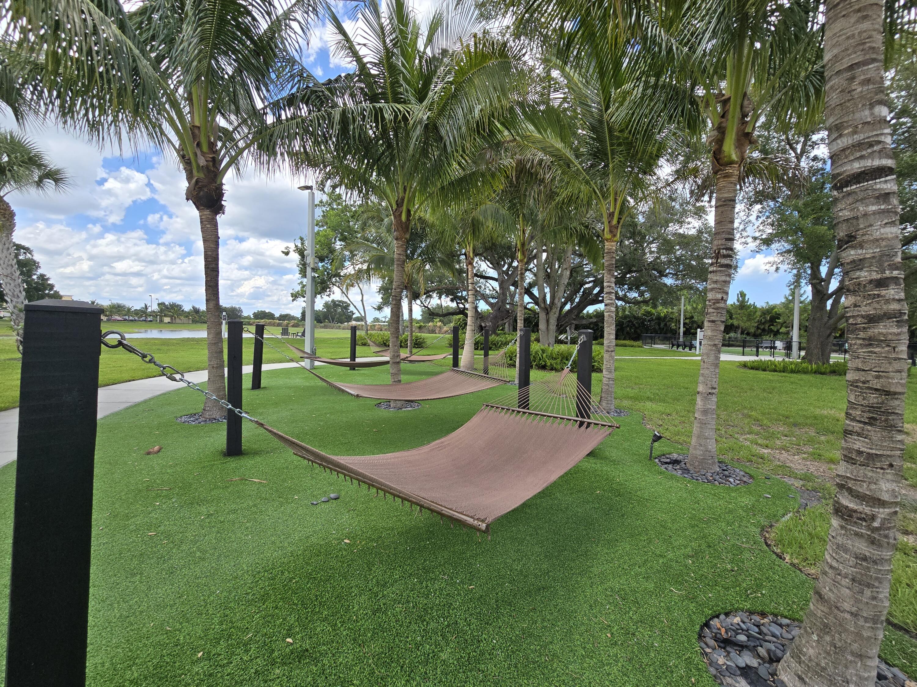 2785 Bosque Circle, Unit 303 Melbourne, FL 32940 - Photo 17 of 18 a view of a park with tree s