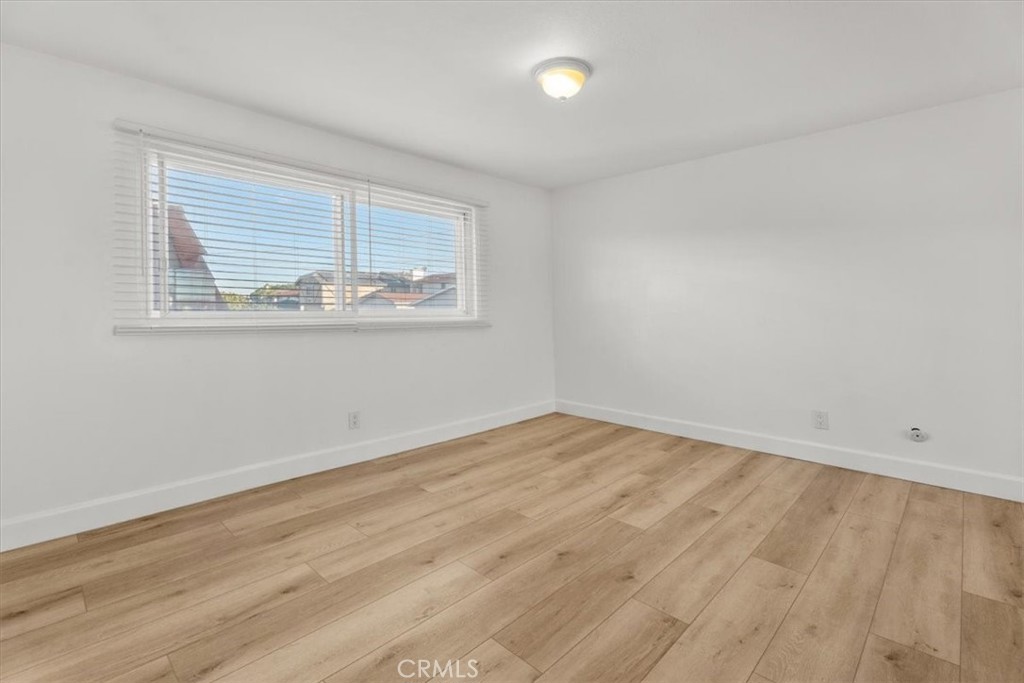 770 West Imperial Avenue El Segundo, CA 90245 - Photo 11 of 21 wooden floor in an empty room with a window