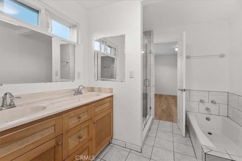 770 West Imperial Avenue El Segundo, CA 90245 - Photo 13 of 21 a bathroom with a tub sink and mirror