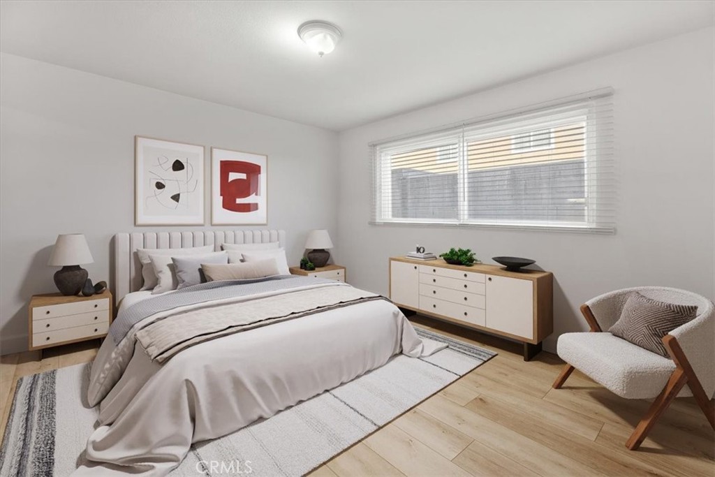 770 West Imperial Avenue El Segundo, CA 90245 - Photo 15 of 21 a bedroom with a bed and a couch