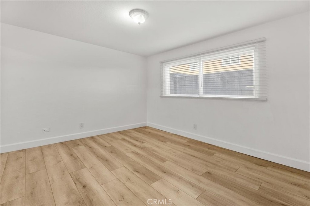 770 West Imperial Avenue El Segundo, CA 90245 - Photo 16 of 21 a view of an empty room with wooden floor and a window