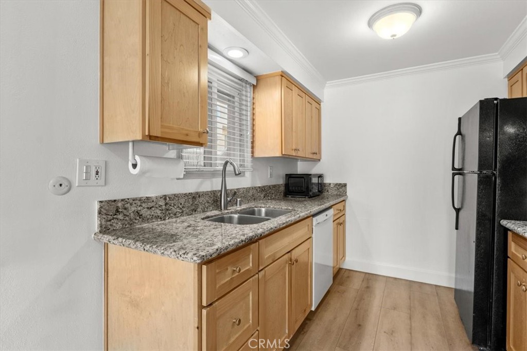 770 West Imperial Avenue El Segundo, CA 90245 - Photo 9 of 21 a kitchen with stainless steel appliances granite countertop a sink stove and refrigerator