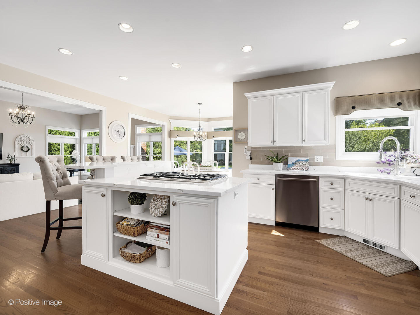 39-w740 Walt Whitman Road St. Charles, IL 60175 - Photo 12 of 39 a kitchen with a sink cabinets and wooden floor
