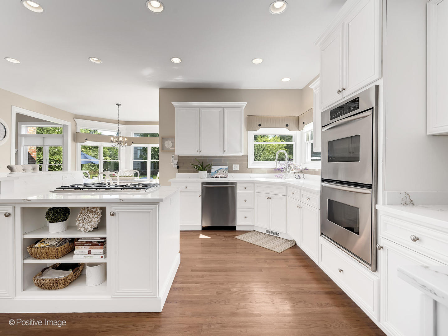 39-w740 Walt Whitman Road St. Charles, IL 60175 - Photo 13 of 39 a kitchen with stainless steel appliances kitchen island granite countertop a stove a sink and a refrigerator