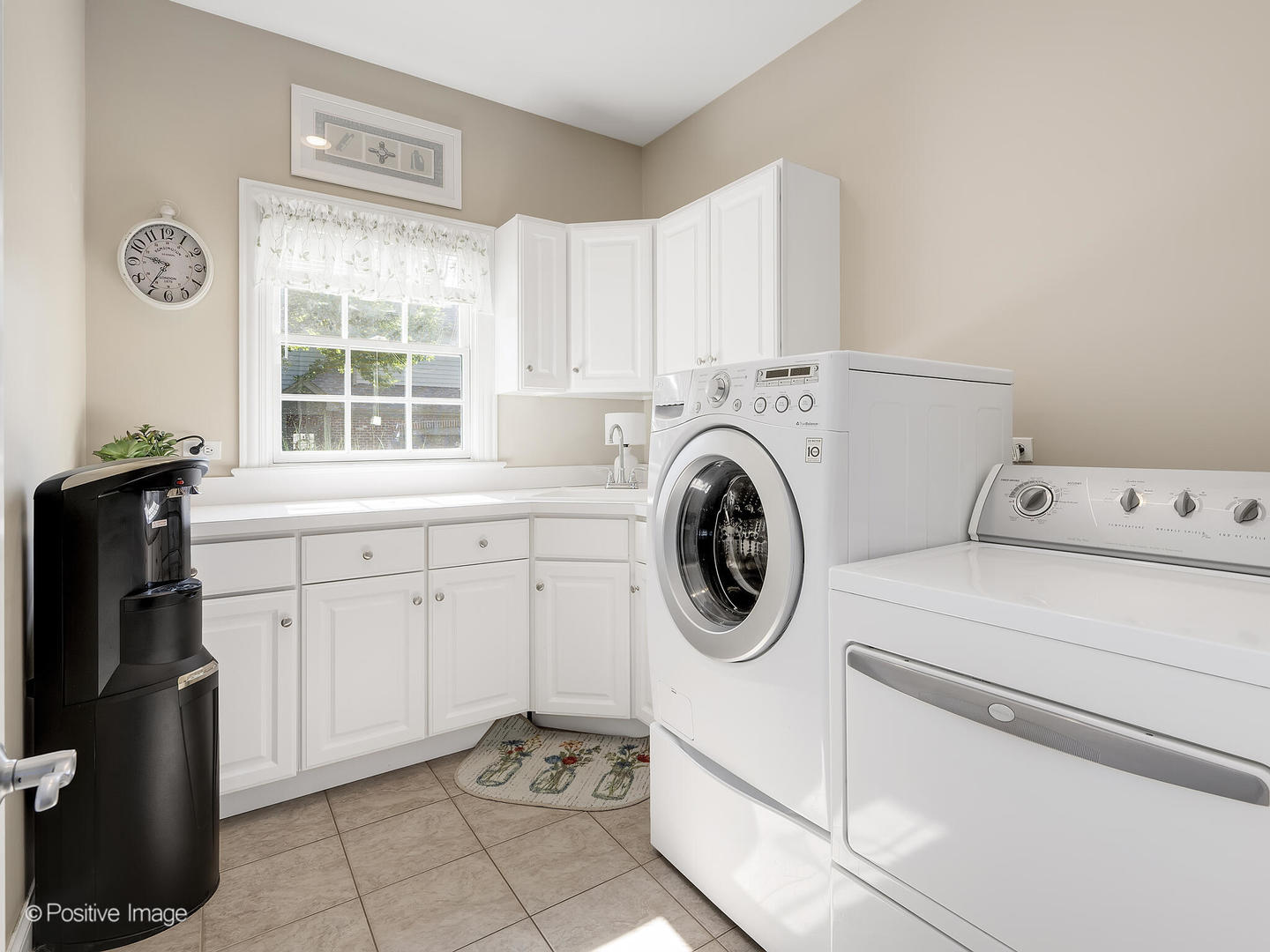 39-w740 Walt Whitman Road St. Charles, IL 60175 - Photo 16 of 39 a utility room with dryer and washer
