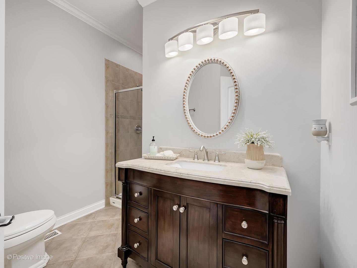 39-w740 Walt Whitman Road St. Charles, IL 60175 - Photo 17 of 39 a bathroom with a granite countertop sink a mirror and toilet