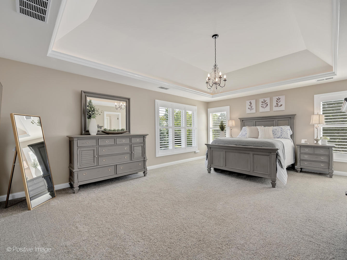 39-w740 Walt Whitman Road St. Charles, IL 60175 - Photo 19 of 39 a spacious bedroom with a bed a couch and dresser