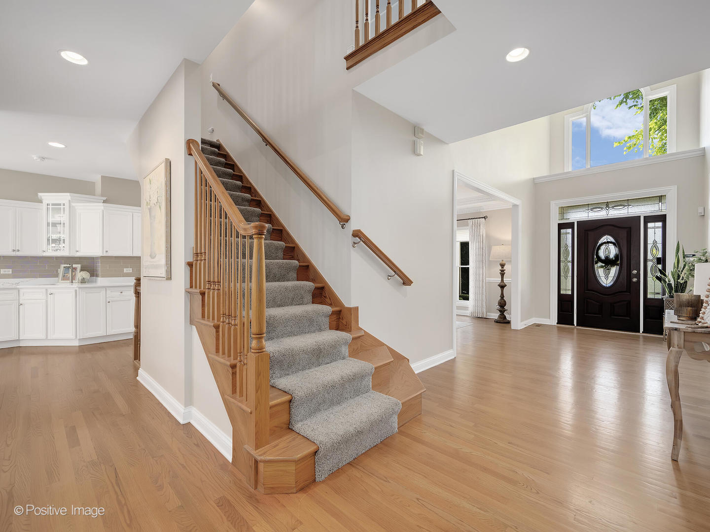 39-w740 Walt Whitman Road St. Charles, IL 60175 - Photo 2 of 39 a view of entryway and hall with wooden floor