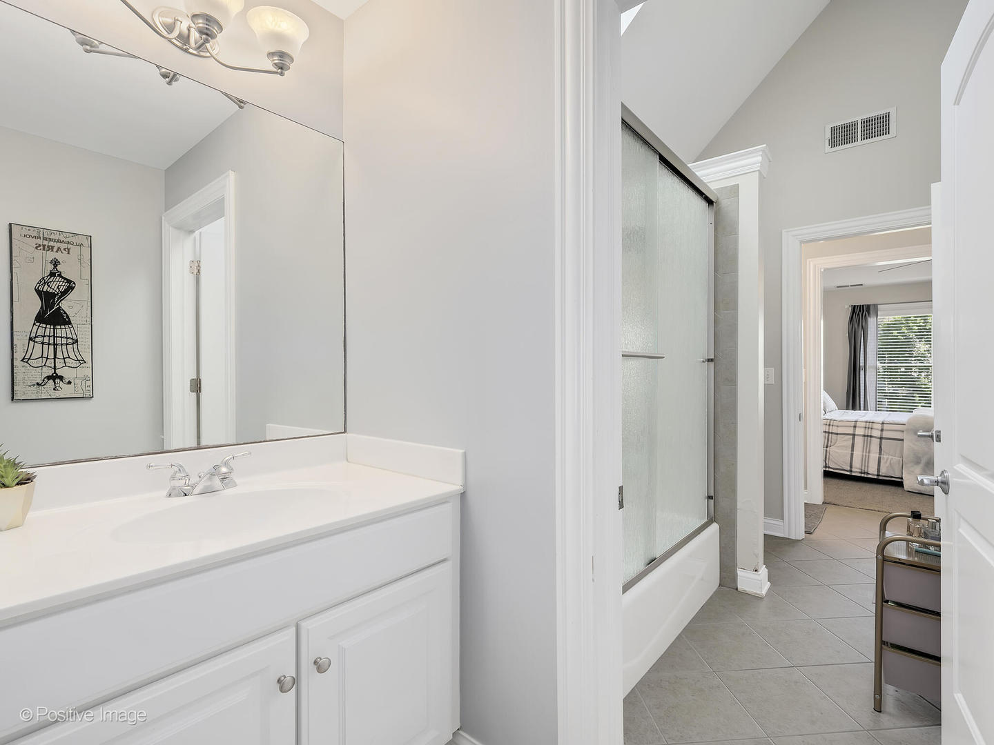 39-w740 Walt Whitman Road St. Charles, IL 60175 - Photo 24 of 39 a bathroom with a sink a mirror and a shower