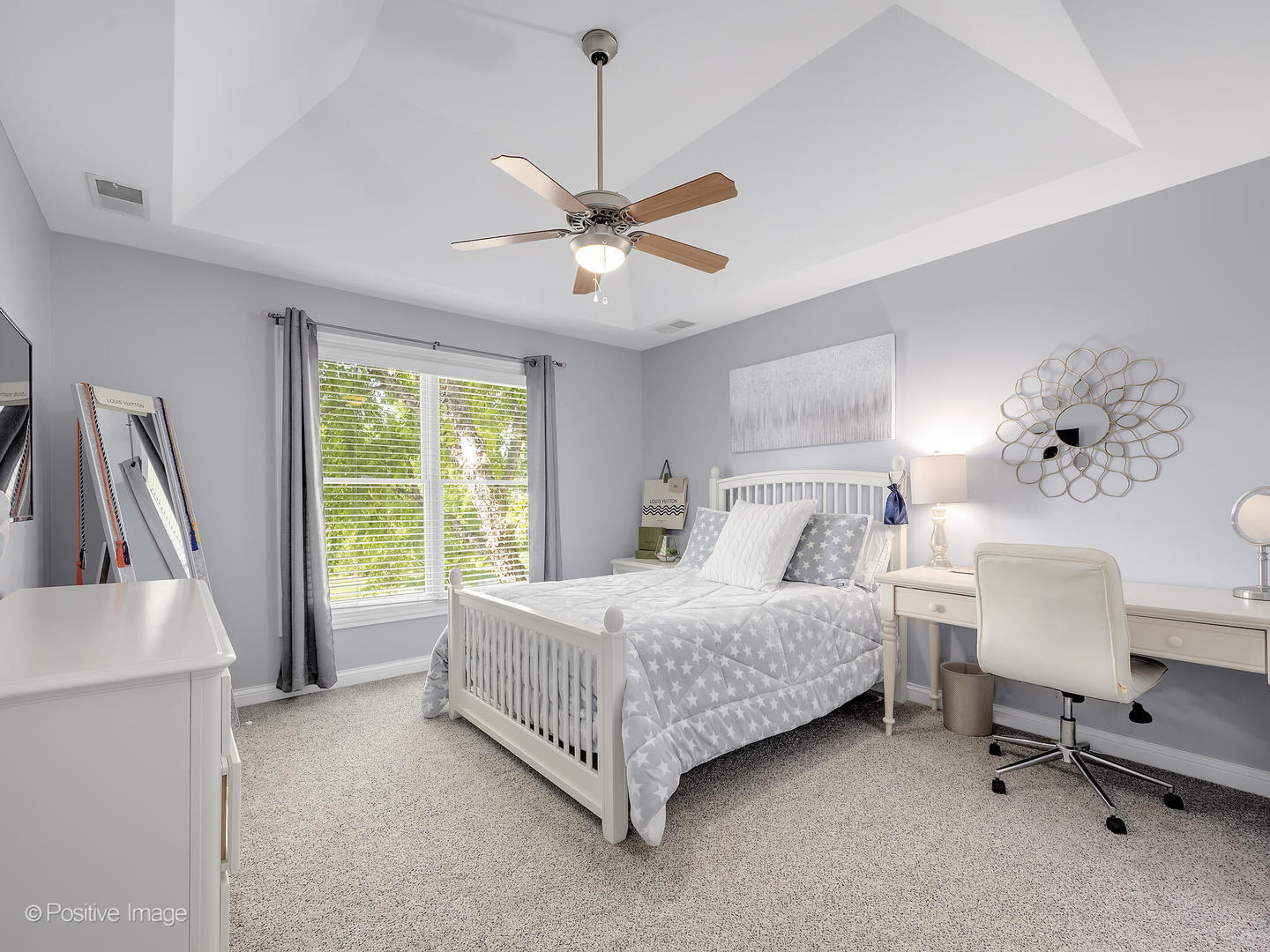 39-w740 Walt Whitman Road St. Charles, IL 60175 - Photo 25 of 39 a spacious bedroom with a bed chandelier and a window