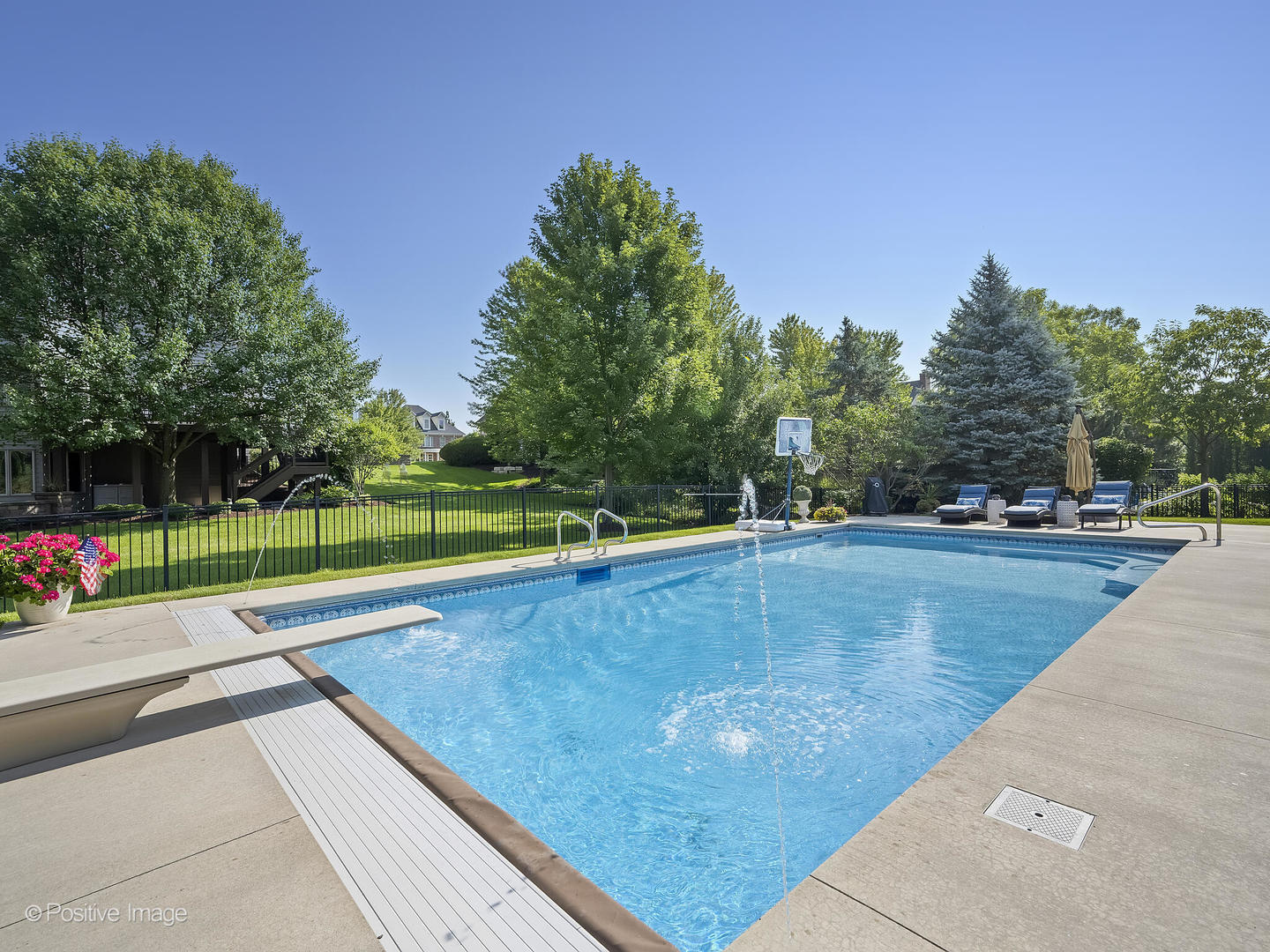39-w740 Walt Whitman Road St. Charles, IL 60175 - Photo 30 of 39 a view of a swimming pool with a yard and trees