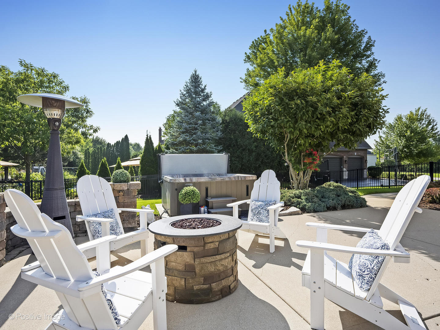 39-w740 Walt Whitman Road St. Charles, IL 60175 - Photo 35 of 39 a view of a patio with table and chairs potted plants with wooden fence