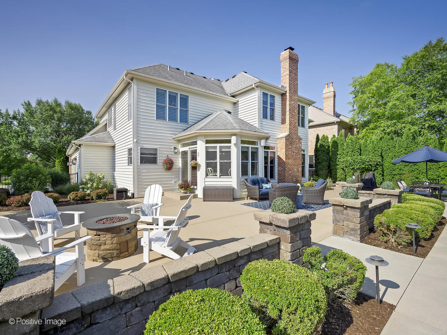 39-w740 Walt Whitman Road St. Charles, IL 60175 - Photo 36 of 39 a view of a patio with couches table and chairs and potted plants