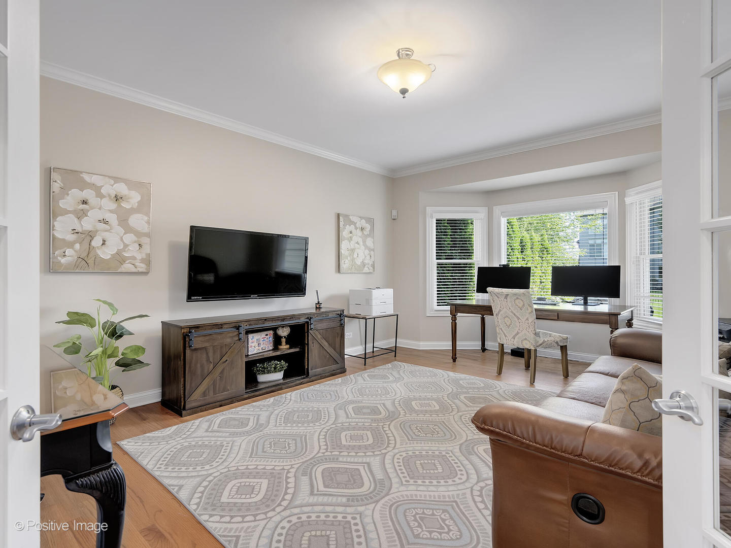 39-w740 Walt Whitman Road St. Charles, IL 60175 - Photo 4 of 39 a living room with furniture and a flat screen tv