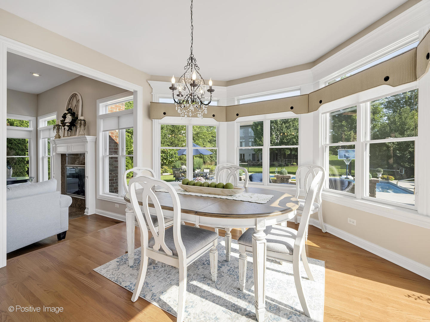 39-w740 Walt Whitman Road St. Charles, IL 60175 - Photo 8 of 39 a view of a dining room with furniture window and wooden floor