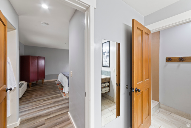 100 West 200 South, Unit 118 Moab, UT 84532 - Photo 16 of 39 Hallway featuring light wood-type flooring
