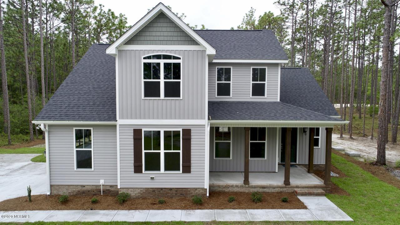 1040 Nicklaus Road Southport, NC 28461 - Photo 3 of 36 Picture is from a previous built home. Exact finishes may not apply.
