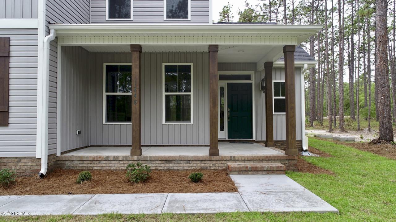 1040 Nicklaus Road Southport, NC 28461 - Photo 5 of 36 Picture is from a previous built home. Exact finishes may not apply.