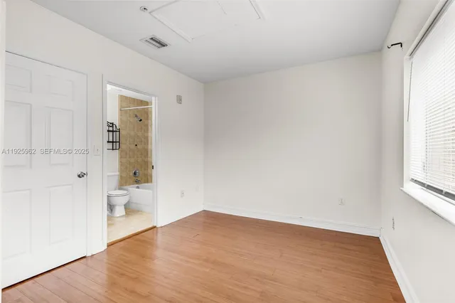 a bathroom with a sink toilet a shower and a mirror
