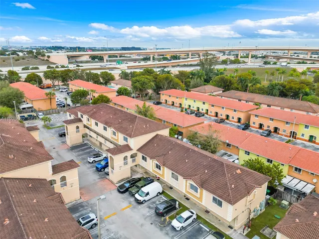 an aerial view of a building with outdoor space