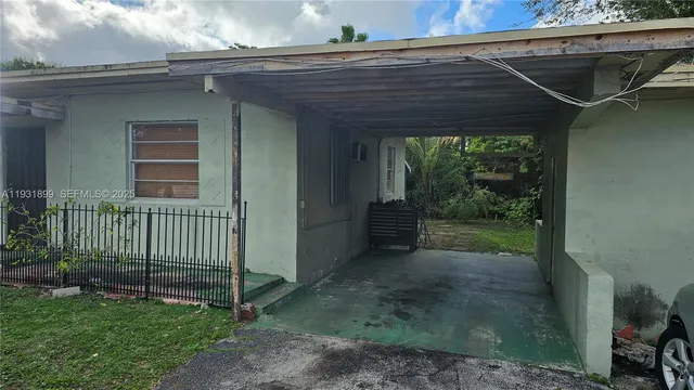 a view of a backyard with a small cabin