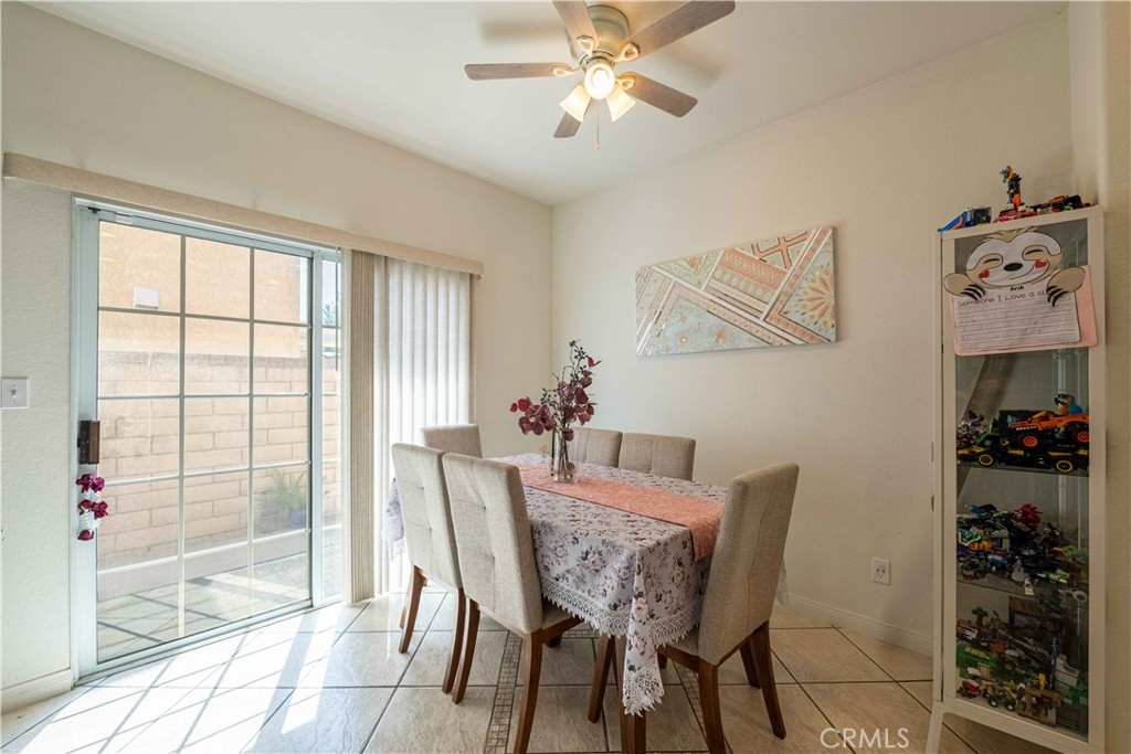 985 Brandon Avenue Simi Valley, CA 93065 - Photo 12 of 48 a view of a dining room with furniture and chandelier